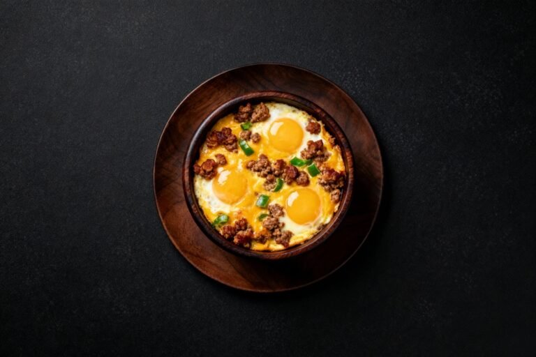 Crockpot Sausage & Green Chile Queso Egg Bake | Kevin Wagonfoot